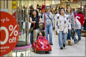 Shoppers inside a mall.